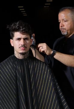 BARBER STRONG - The Barber Cape - Black With 24k Gold Pinstripe -Care Product Shop BSC10 BLK GOLD Black Gold Stripes Barber Cape Lifestyle 1800x1800 05399.1600240585