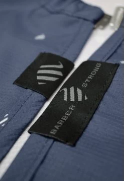 BARBER STRONG - The Barber Cape - Barber Shield Blue 12 BARBER STRONG - The Barber Cape - Barber Shield Blue -Care Product Shop The Barber Shield Details Blue Details3 1800x1800 67245.1576122824